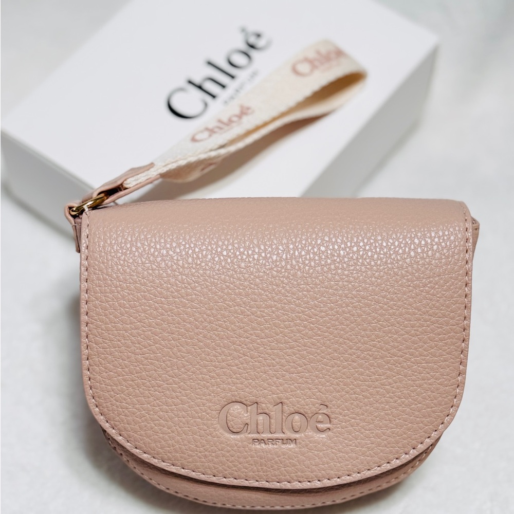 Chloe’ wristlet in blush pink leather.